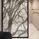vinyl for privacy with a printed tree branch design