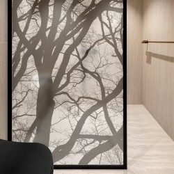 vinyl for privacy with a printed tree branch design